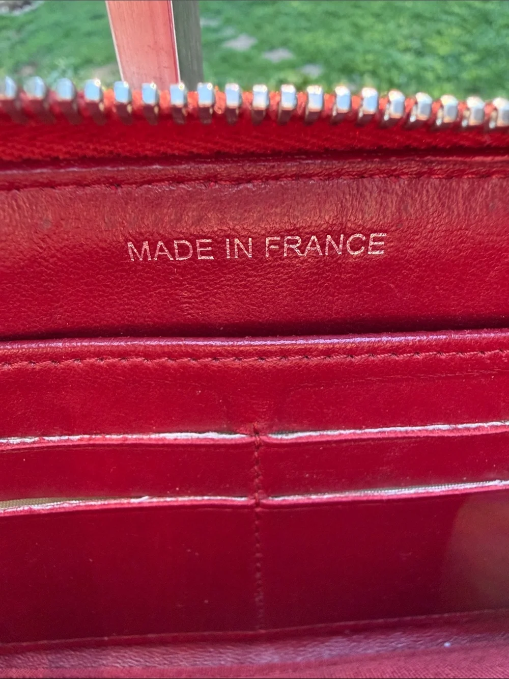 CHANEL Authenticated Quilted Caviar Leather Zip-Around Wallet in Burgundy/red